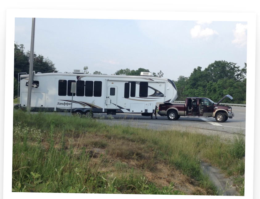 RV and truck on the roadside
