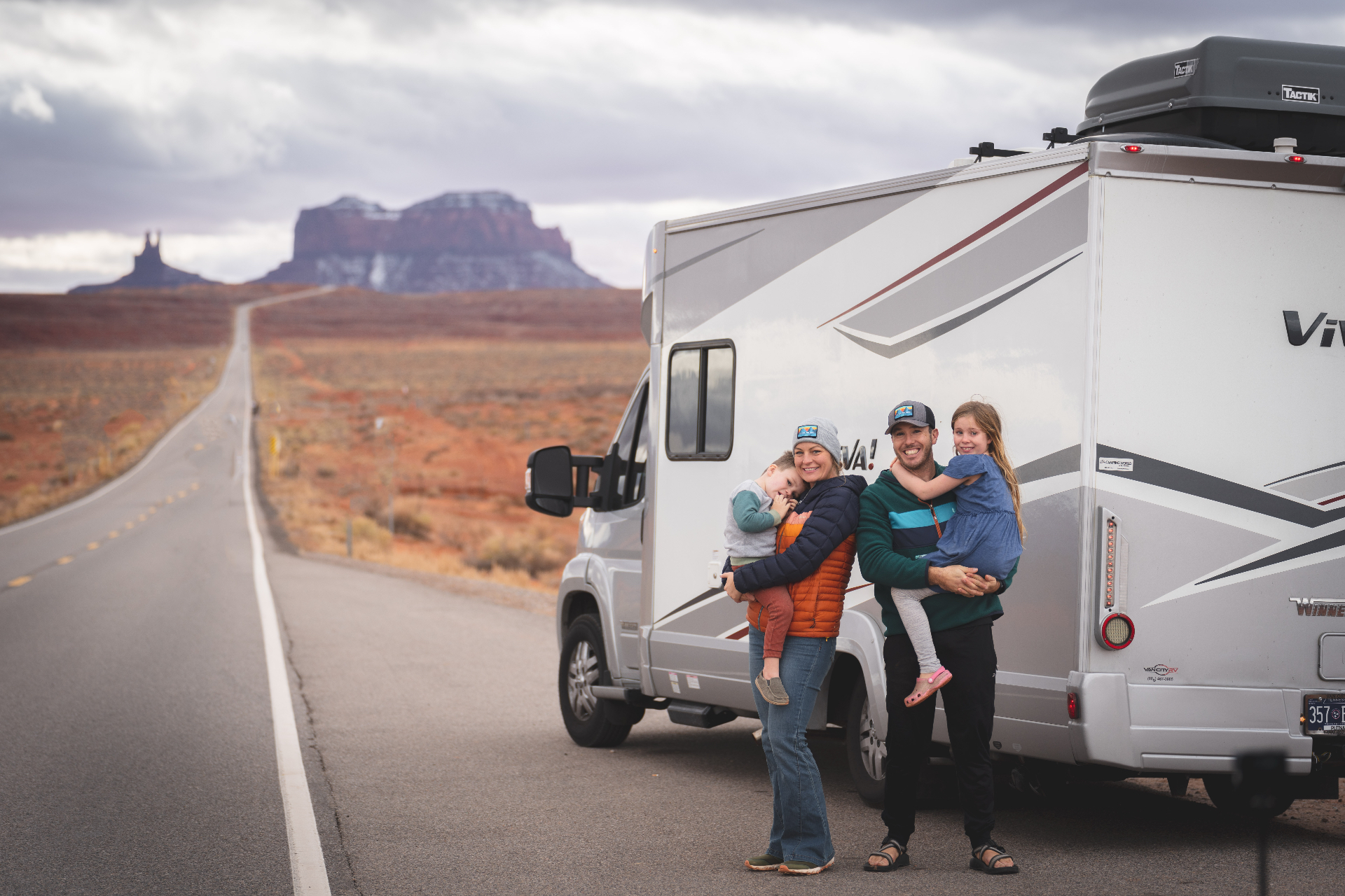 Family with RV on the open road
